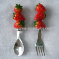 Adorable baby spoon with polyresin straberry handle